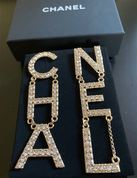 how long are the real chanel letter earrings|real Chanel jewelry sign.